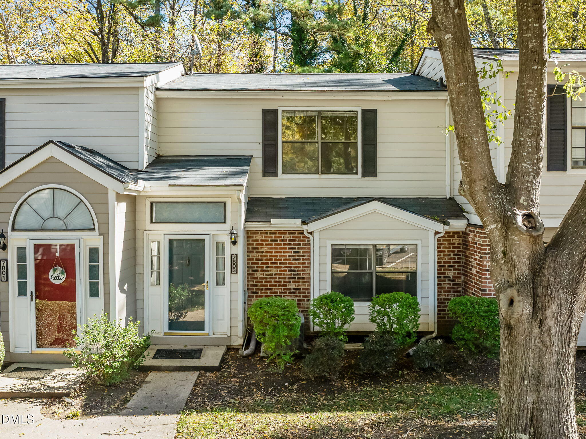 7803 Falcon Rest Circle Raleigh, NC 27615 - Photo 2 of 38 front view of a house with a yard