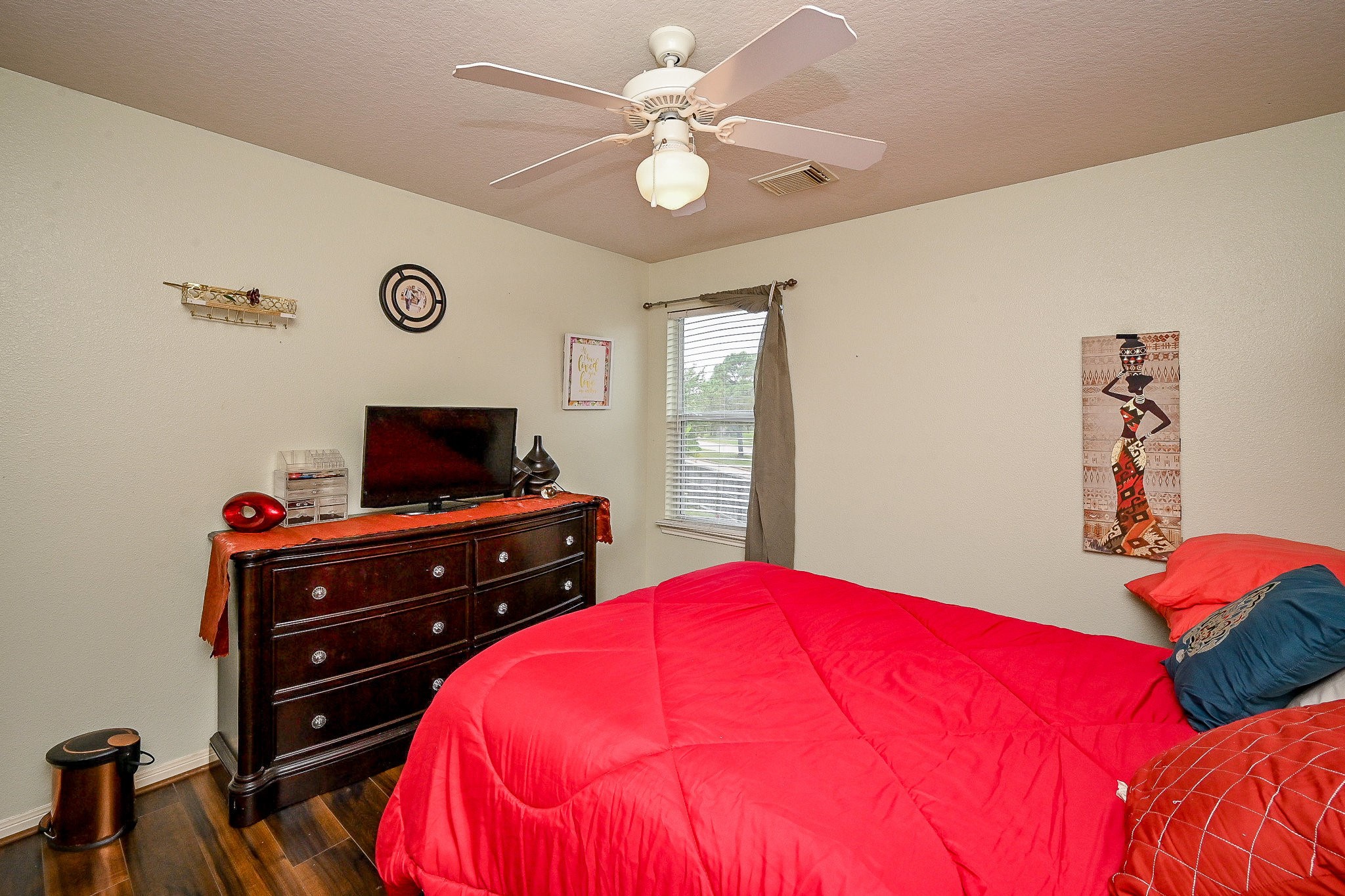 719 Winter Pines Court Spring, TX 77373 - Photo 14 of 20 a bed room with a bed and a television