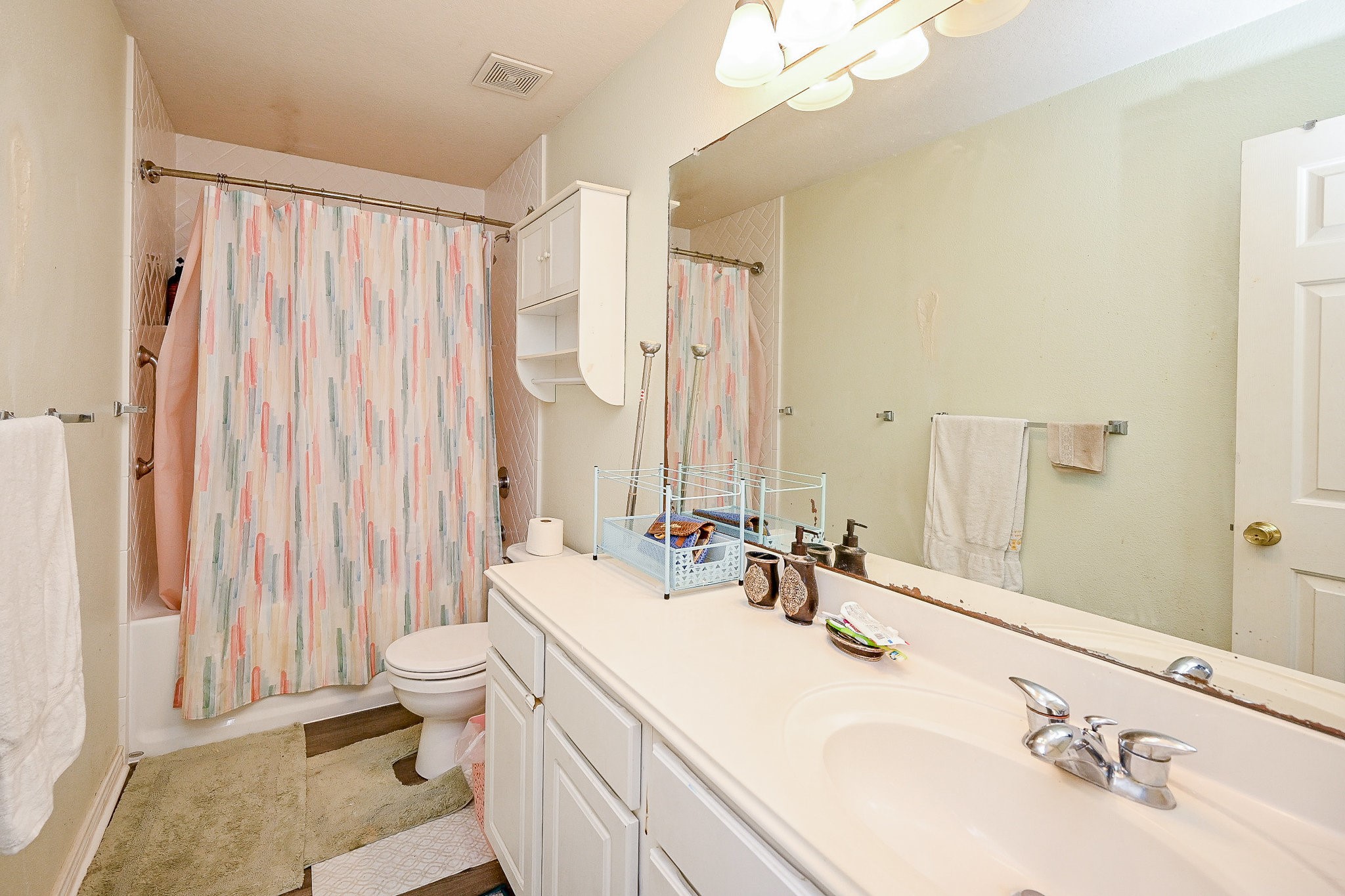 719 Winter Pines Court Spring, TX 77373 - Photo 17 of 20 a bathroom with a double vanity sink and a mirror