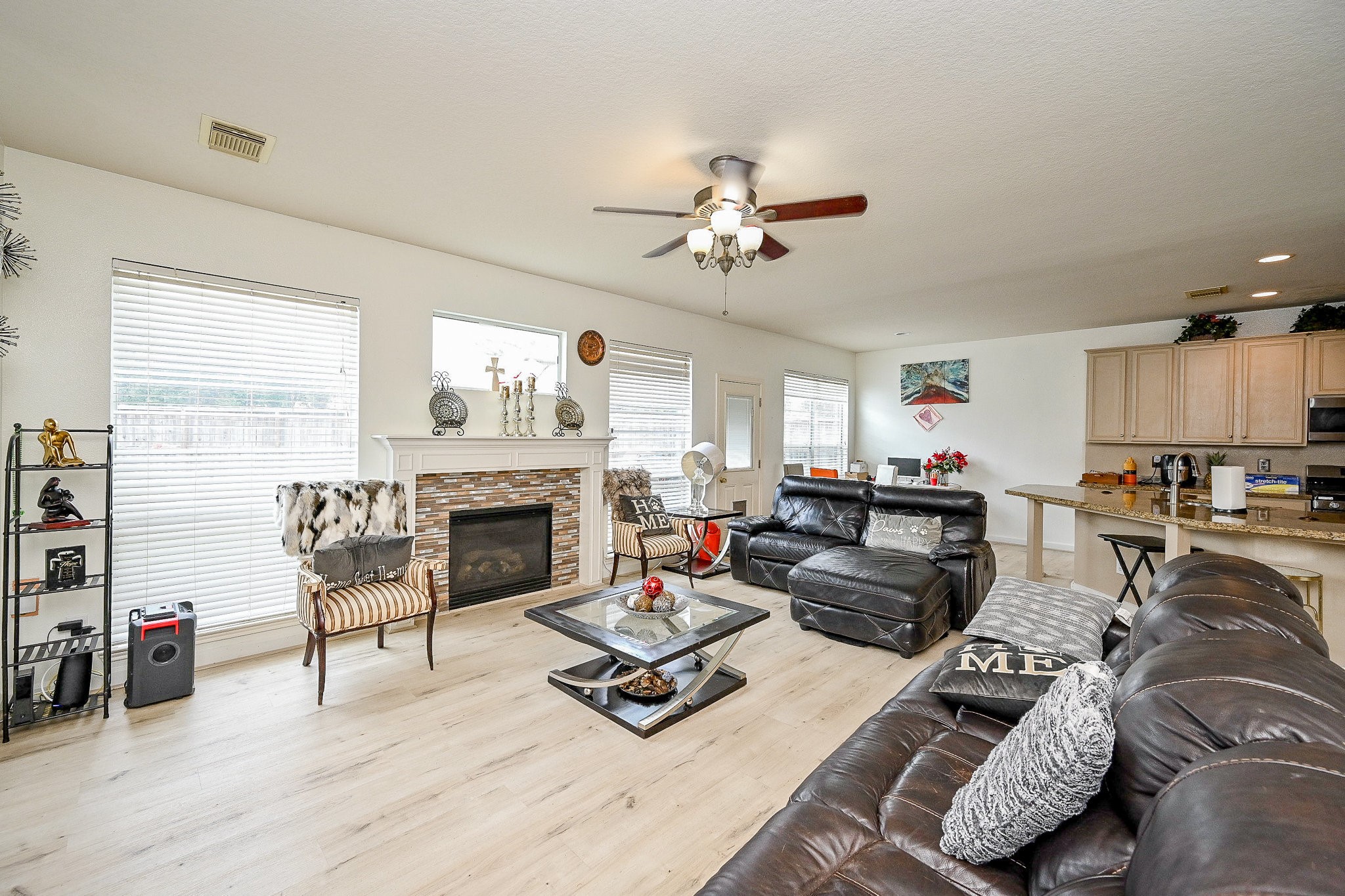 719 Winter Pines Court Spring, TX 77373 - Photo 6 of 20 a living room with furniture and a fireplace