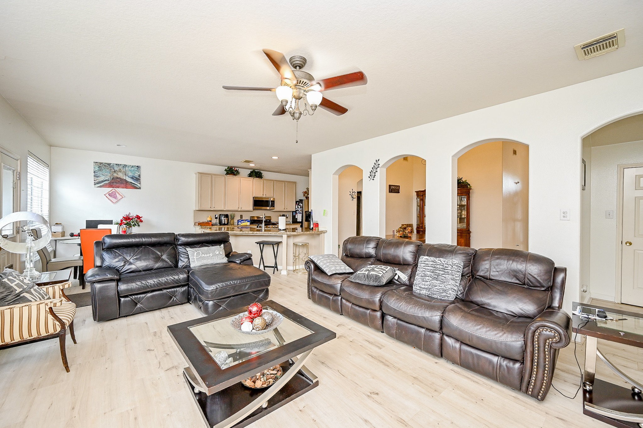 719 Winter Pines Court Spring, TX 77373 - Photo 7 of 20 a living room with furniture and wooden floor