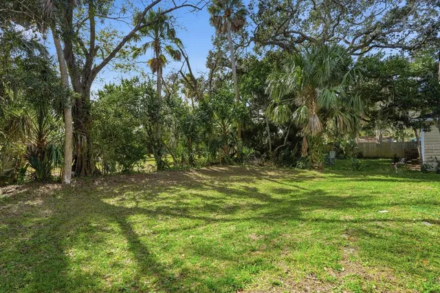 a fire hydrant in the middle of a field