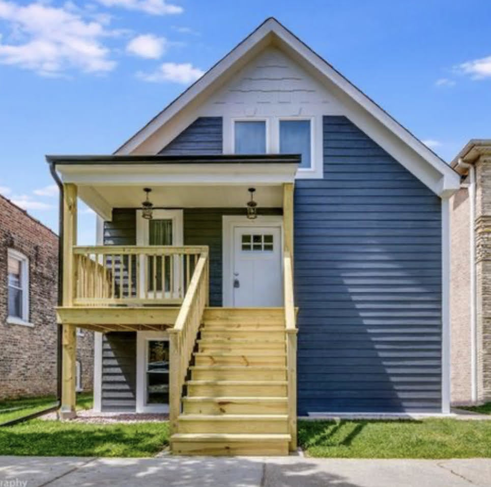 2828 Ridgeland Avenue, Unit 1 Berwyn, IL 60402 - Photo 1 of 9 a front view of a house with a yard