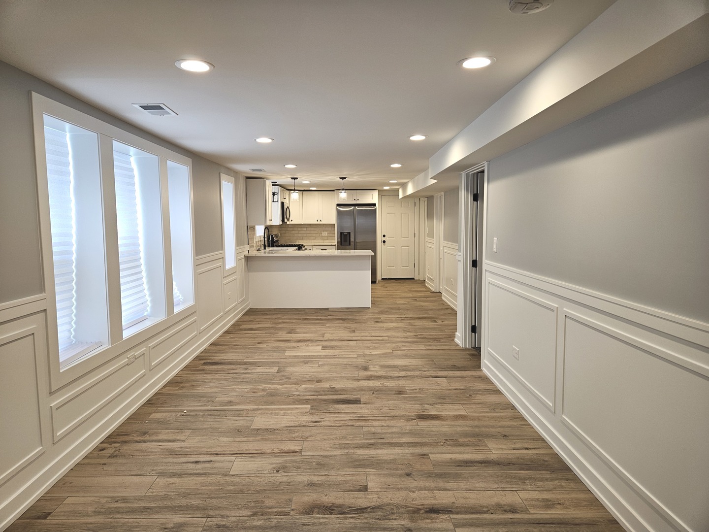 2828 Ridgeland Avenue, Unit 1 Berwyn, IL 60402 - Photo 4 of 9 a view of a kitchen with wooden floor and a window