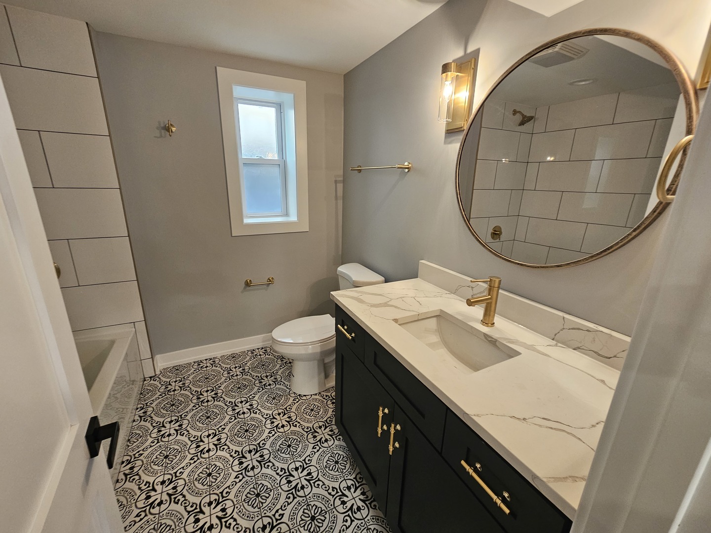 2828 Ridgeland Avenue, Unit 1 Berwyn, IL 60402 - Photo 6 of 9 a bathroom with a sink and a mirror