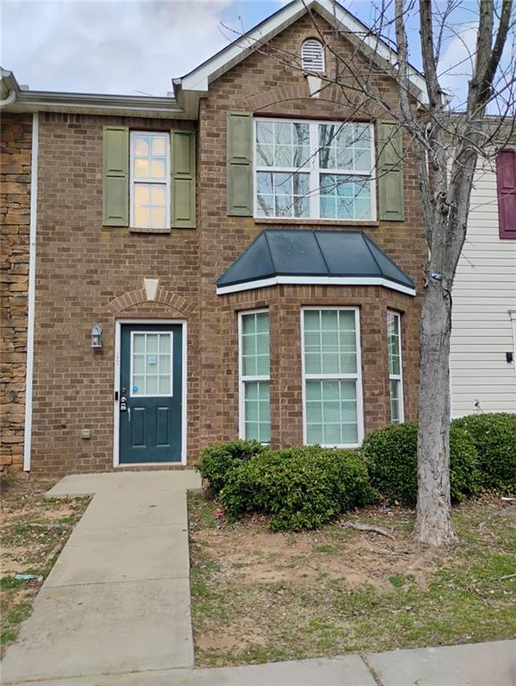 1894 Grove Way Hampton, GA 30228 - Photo 1 of 1 front view of a brick house