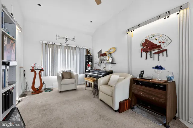 a bedroom with furniture and a couch