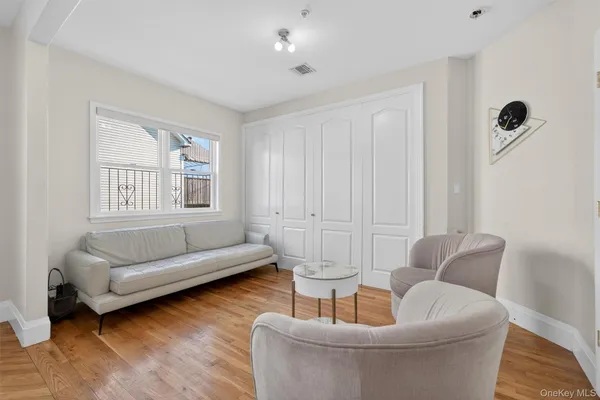 a living room with furniture and a window