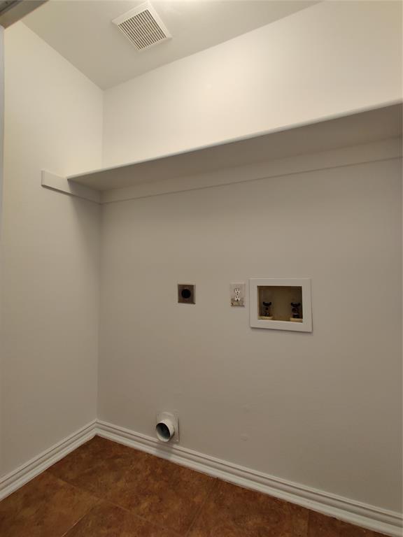 1200 St Regis Drive Irving, TX 75038 - Photo 16 of 17 an empty room with a workbench