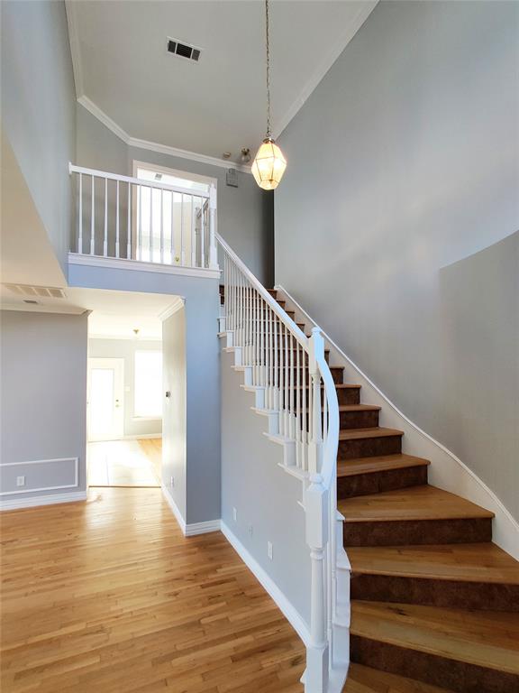 1200 St Regis Drive Irving, TX 75038 - Photo 2 of 17 a view of entryway and hall with wooden floor
