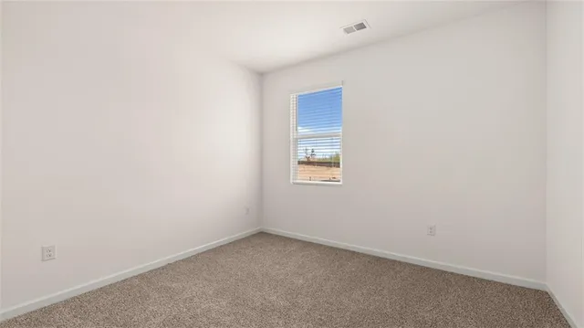 an empty room with closet