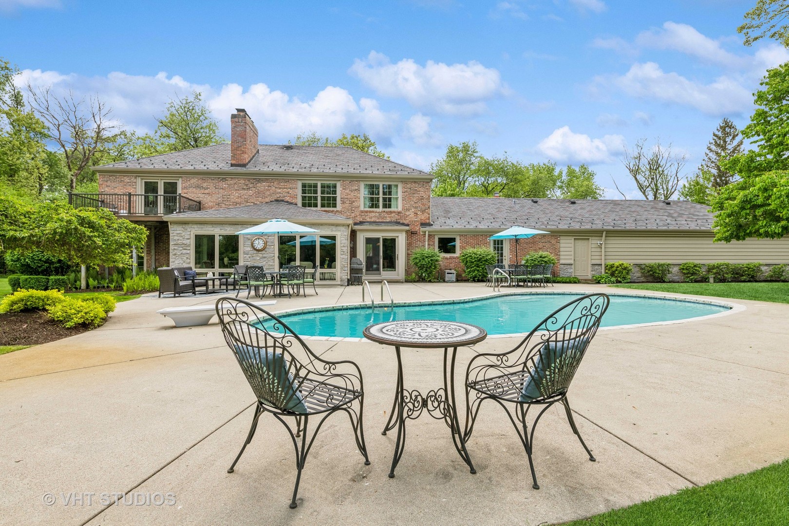 307 Ridge Road Barrington Hills, IL 60010 - Photo 54 of 67 a view of a house with swimming pool and sitting area