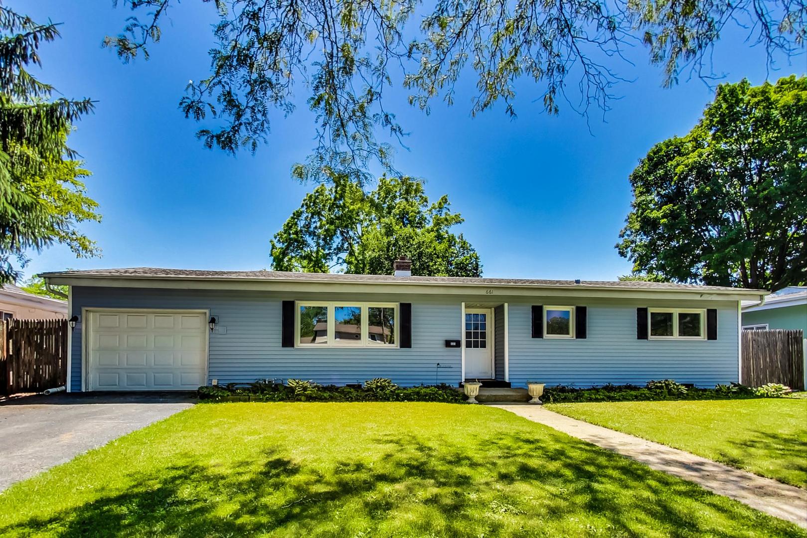 661 East Baldwin Road Palatine, IL 60074 - Photo 1 of 26 front view of a house with a yard