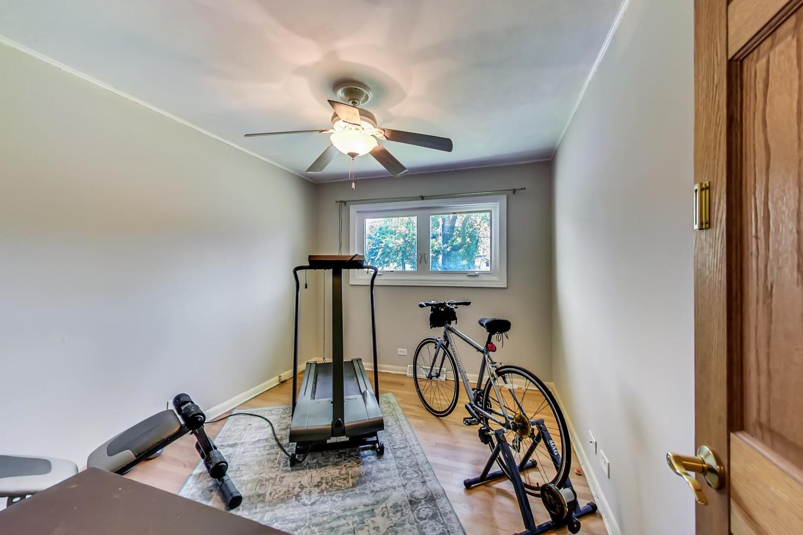 661 East Baldwin Road Palatine, IL 60074 - Photo 18 of 26 a view of a room with gym equipment