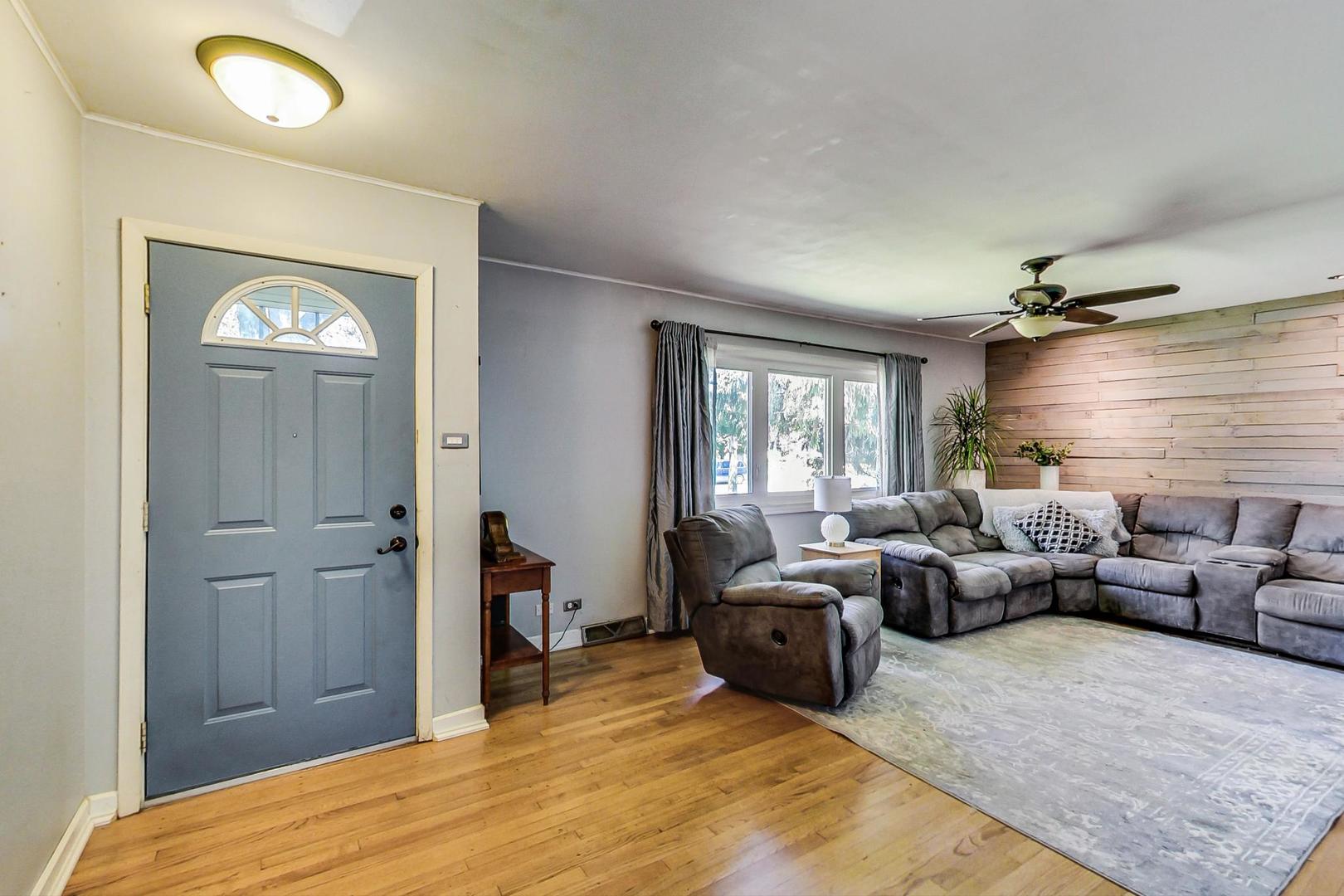 661 East Baldwin Road Palatine, IL 60074 - Photo 5 of 26 a bedroom with furniture and a window