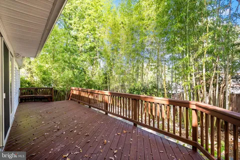 a view of balcony with wooden floor