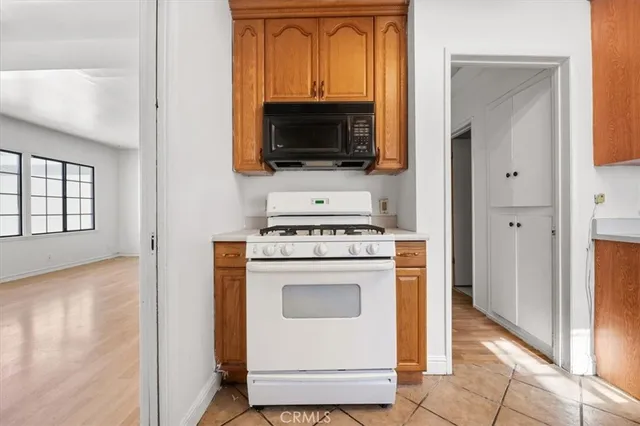 a view of a kitchen with cabinets