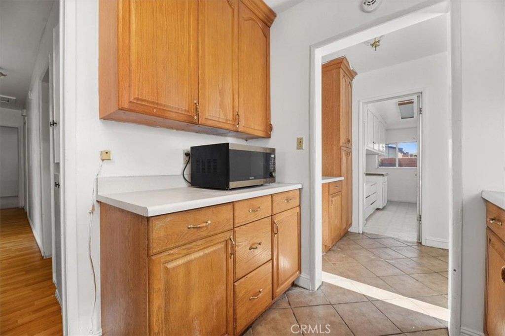 44340 Foxton Avenue Lancaster, CA 93535 - Photo 9 of 25 a view of a kitchen with cabinets