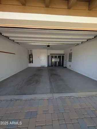 a view of a livingroom with an empty space and a fireplace