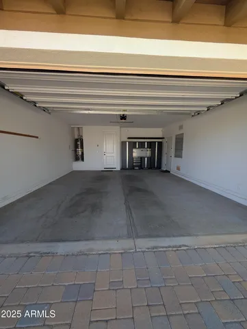 a view of a livingroom with an empty space and a fireplace