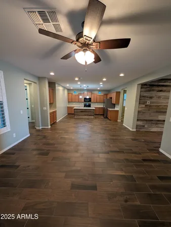 a view of a livingroom with a ceiling fan