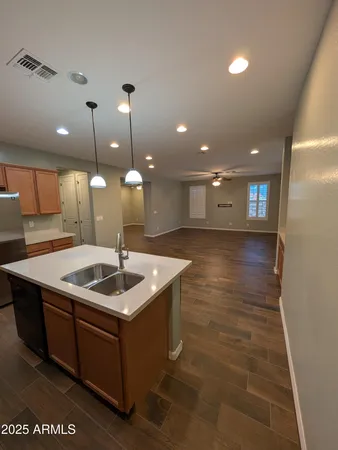 a kitchen with a sink and counter space