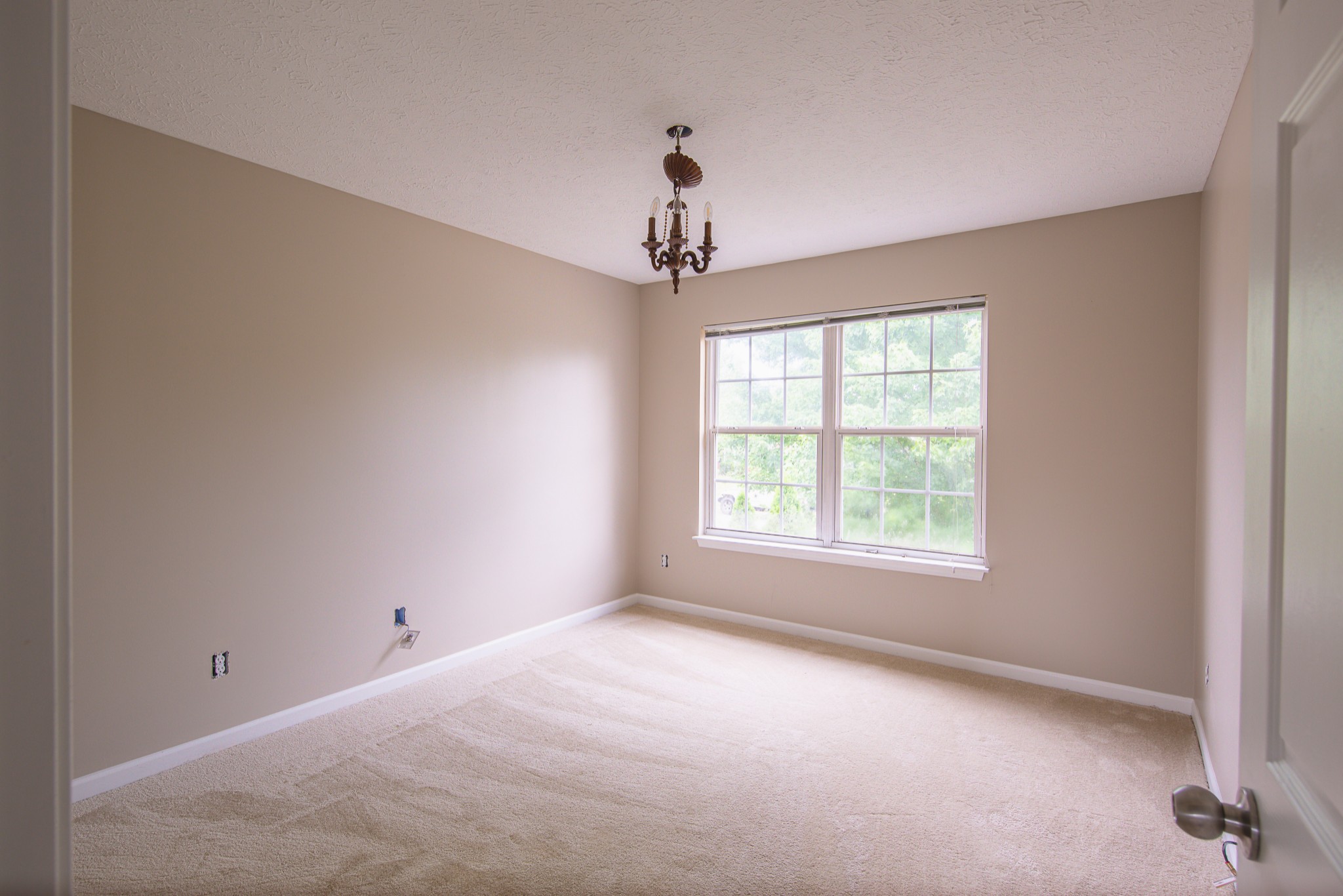 1910 Portway Road Spring Hill, TN 37174 - Photo 18 of 20 en empty room with windows and ceiling fan