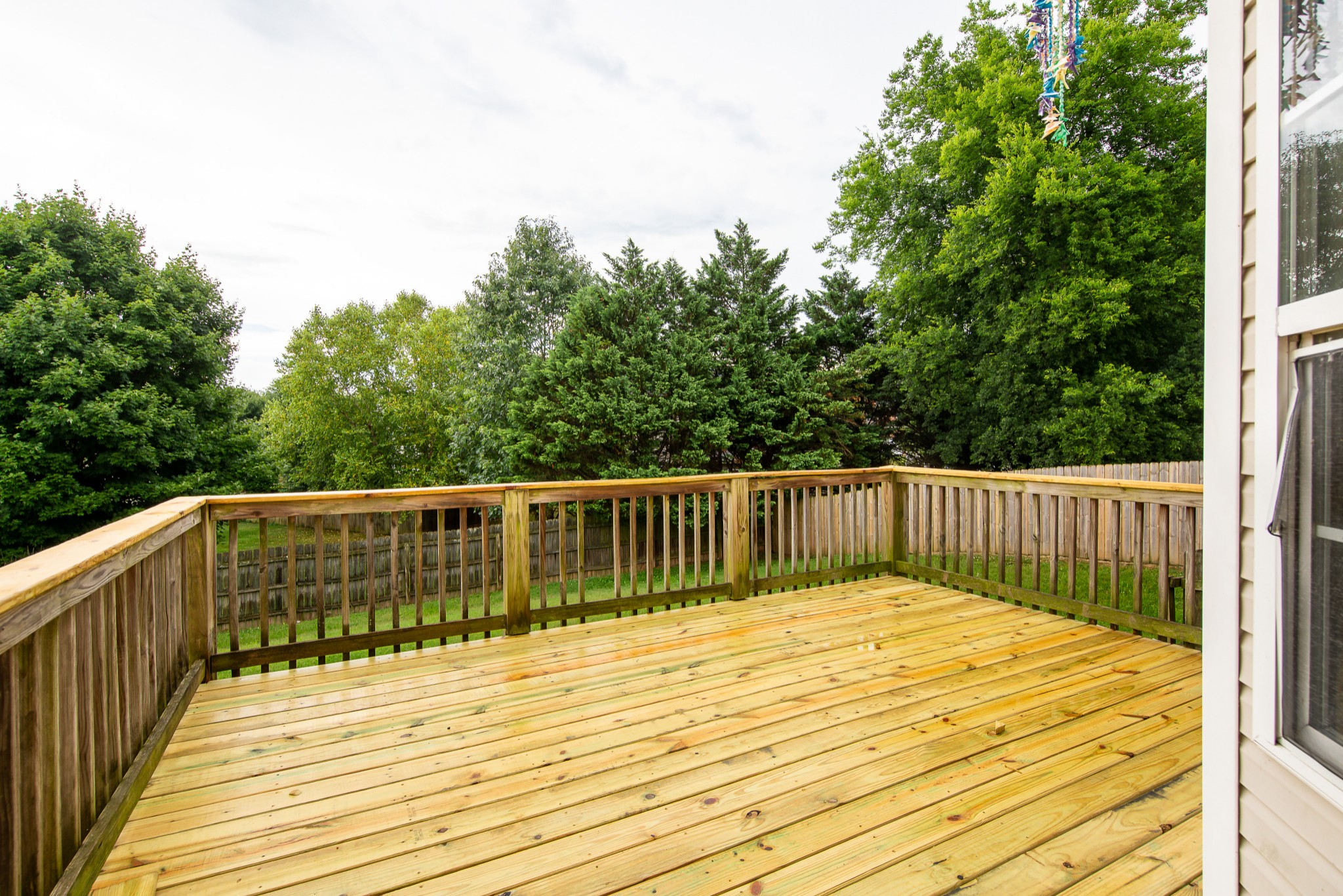 1910 Portway Road Spring Hill, TN 37174 - Photo 20 of 20 a balcony with wooden floor and fence