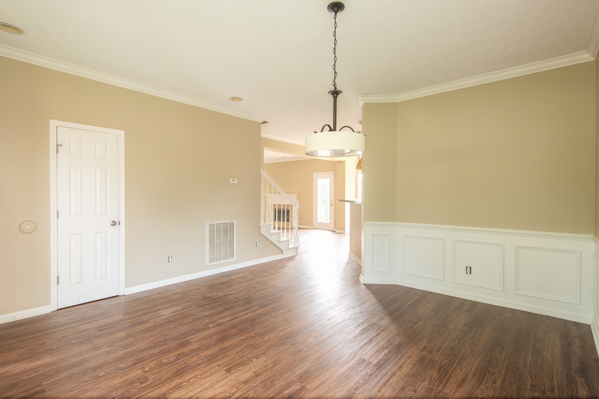 1910 Portway Road Spring Hill, TN 37174 - Photo 4 of 20 a view of an empty room with wooden floor