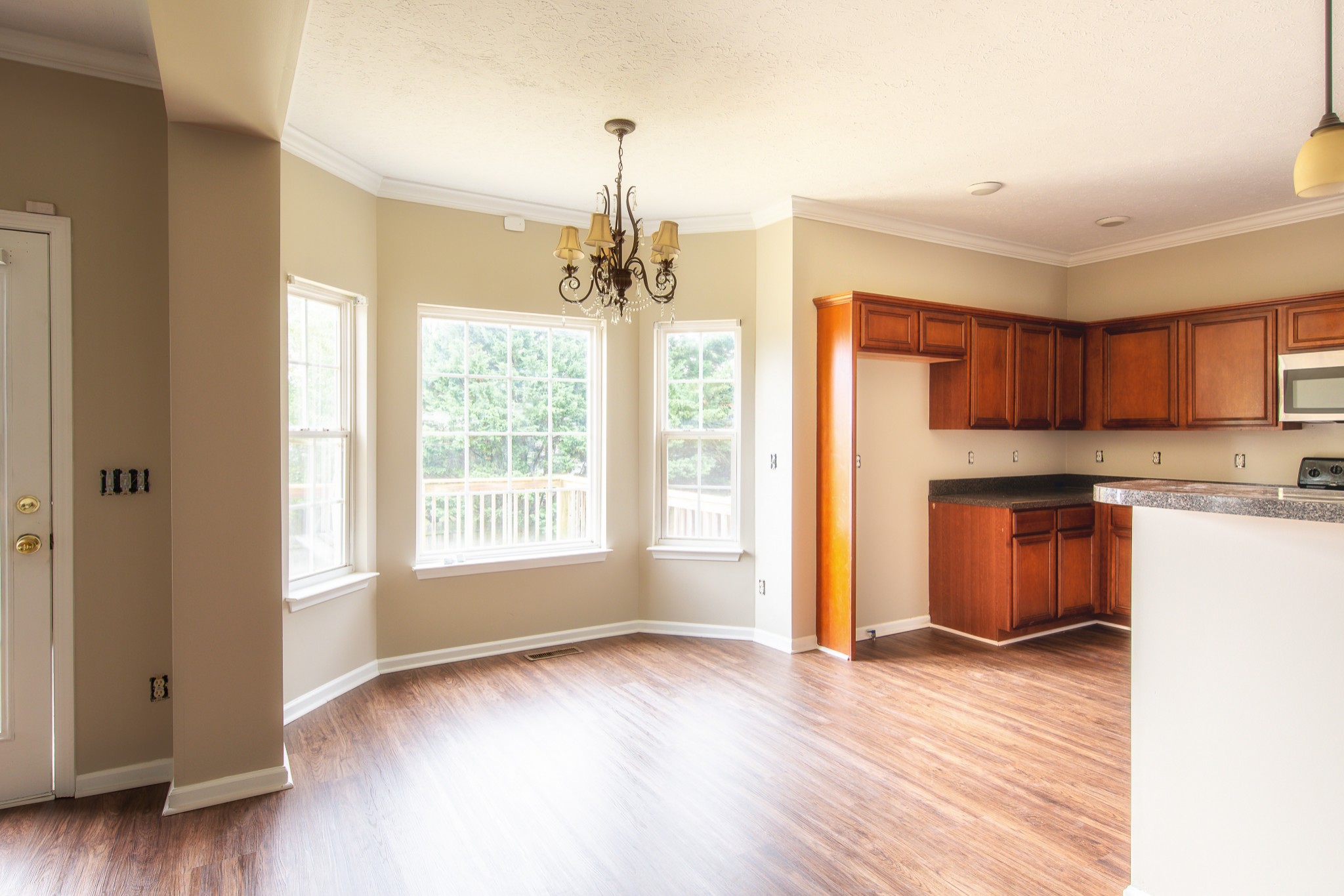 1910 Portway Road Spring Hill, TN 37174 - Photo 10 of 20 a view of a kitchen with wooden floor and a window