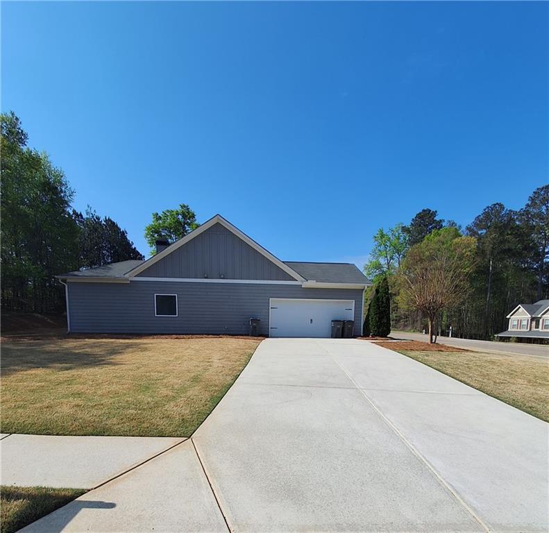 110 Spetchley Way Bogart, GA 30622 - Photo 2 of 13 a view of a house with a yard