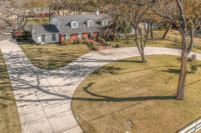 a view of swimming pool with a yard