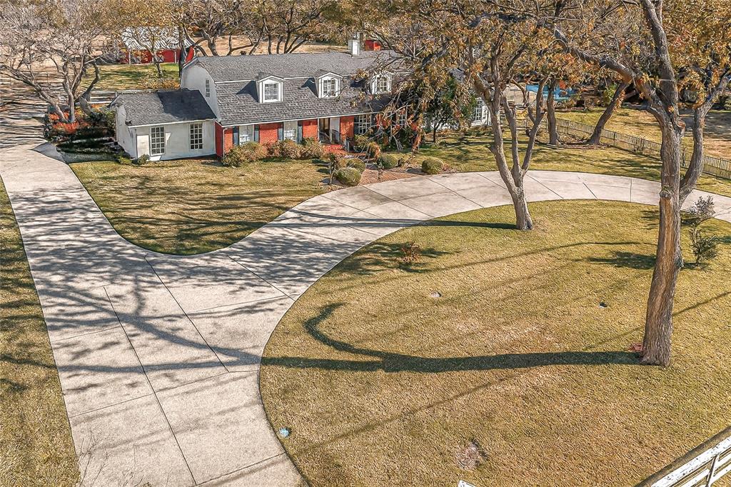 a view of swimming pool with a yard