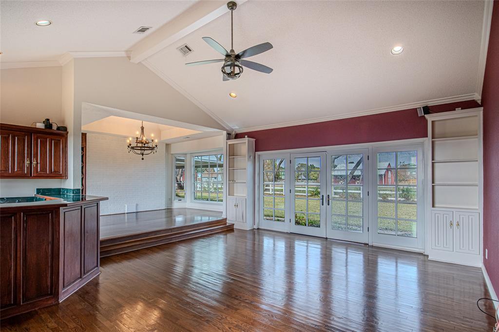 9310 Merritt Road Rowlett, TX 75089 - Photo 16 of 40 a view of room with window and wooden floor