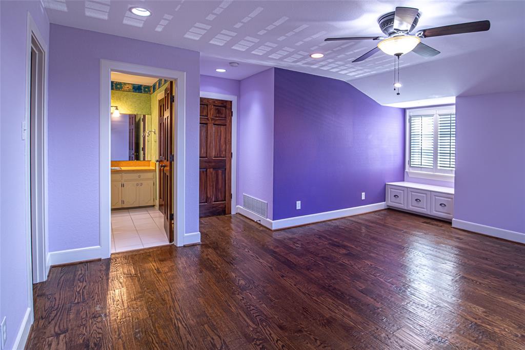 9310 Merritt Road Rowlett, TX 75089 - Photo 23 of 40 a view of empty room with wooden floor and fan