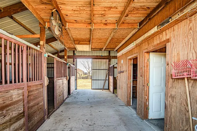 a view of a room with wooden walls