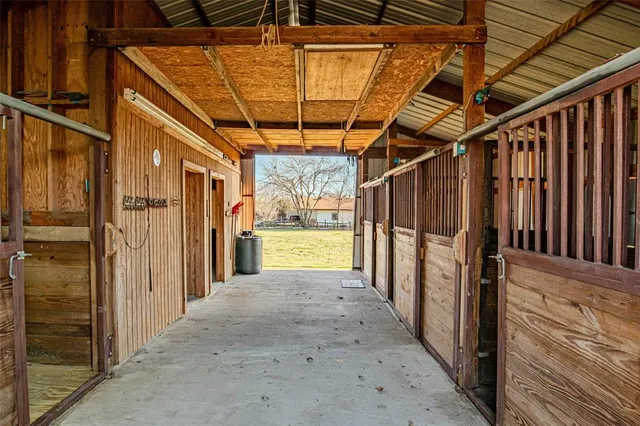 a view of a storage room with wooden walls
