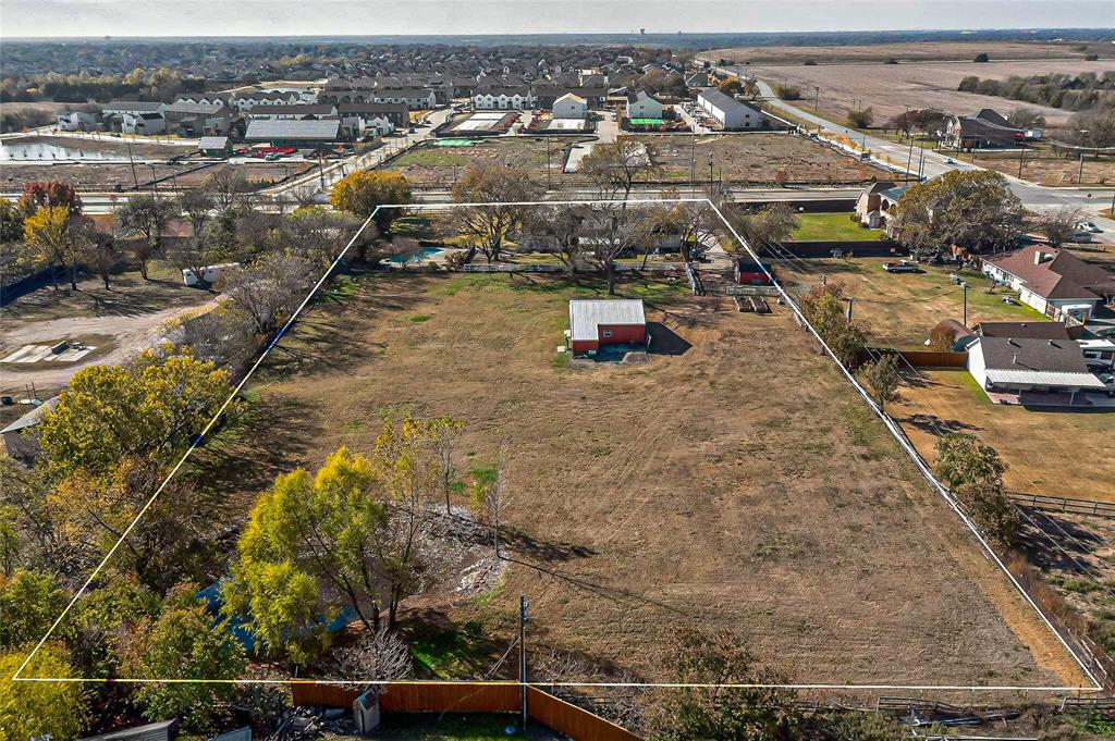 9310 Merritt Road Rowlett, TX 75089 - Photo 36 of 40 an aerial view of residential houses with outdoor space