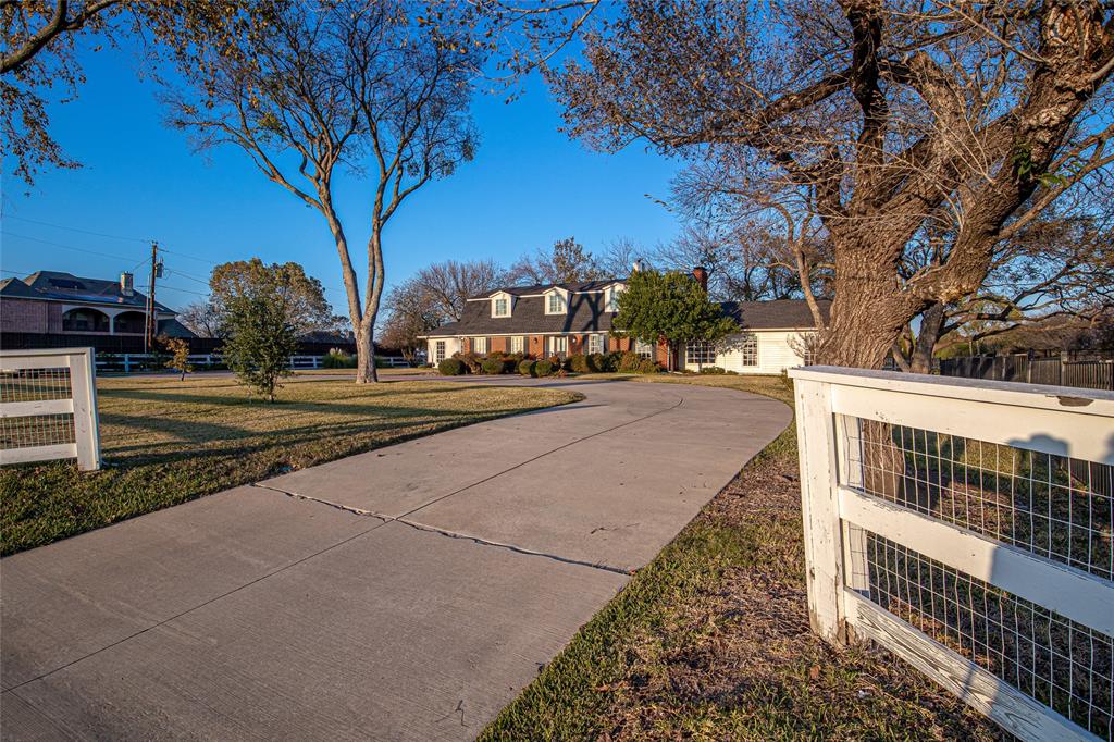 9310 Merritt Road Rowlett, TX 75089 - Photo 39 of 40 a view of a street with houses