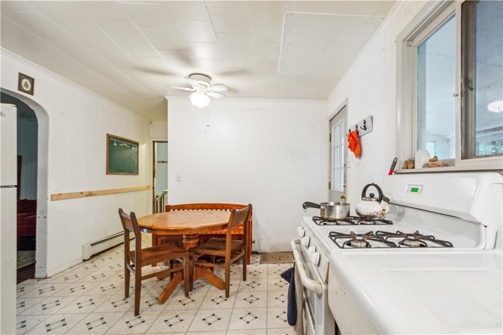 728 State Rte 1033 Templeton, PA 16259 - Photo 21 of 49 a kitchen with a stove and a table