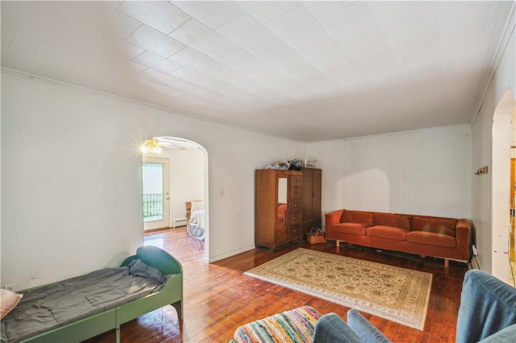 728 State Rte 1033 Templeton, PA 16259 - Photo 24 of 49 a bedroom with a bed and wooden floor