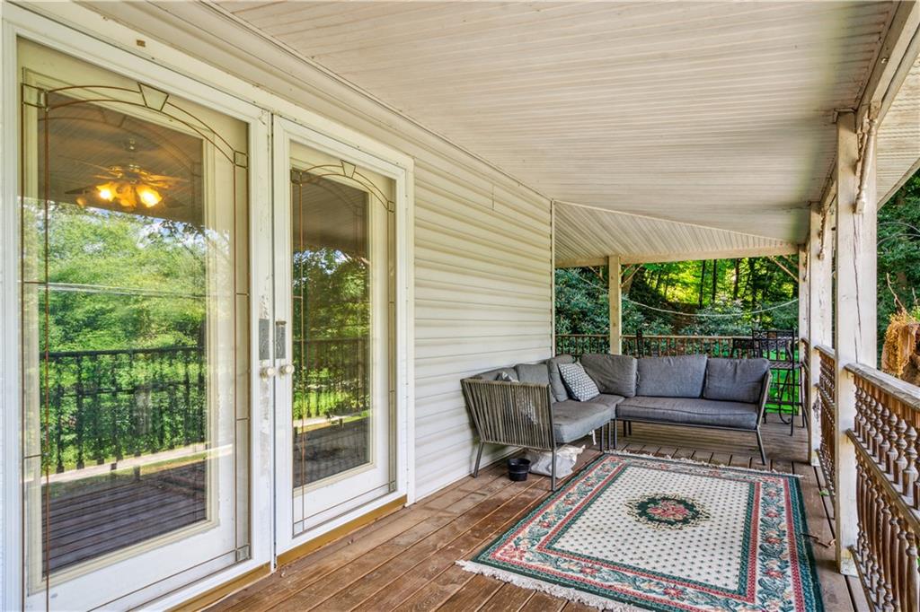 728 State Rte 1033 Templeton, PA 16259 - Photo 27 of 49 a balcony with furniture and a potted plant