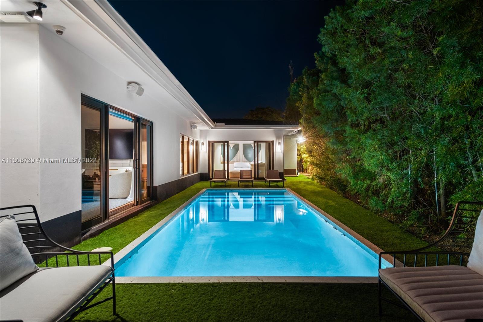 2021 North Bay Road Miami Beach, FL 33140 - Photo 31 of 38 a view of swimming pool with chairs