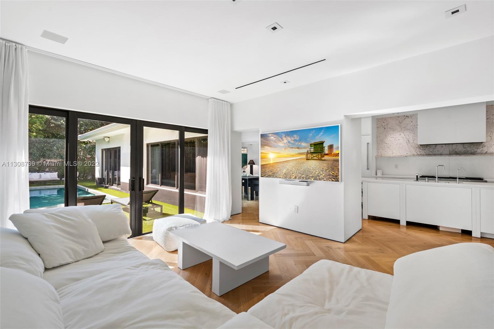 2021 North Bay Road Miami Beach, FL 33140 - Photo 8 of 38 a living room with furniture and large window