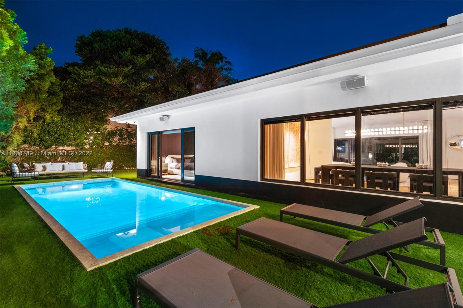 2021 North Bay Road Miami Beach, FL 33140 - Photo 9 of 38 a view of swimming pool with chairs