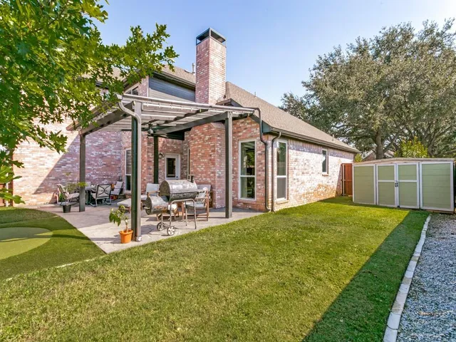 a view of a house with a patio