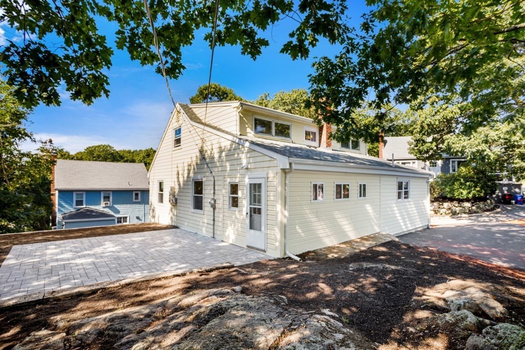 11 Allison Road Saugus, MA 01906 - Photo 24 of 28 a view of a white house with a large tree