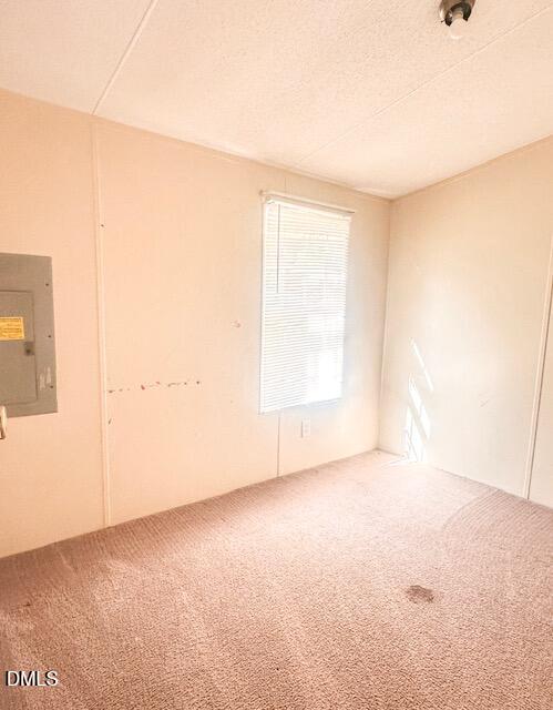 7537 Sam Young Road Oxford, NC 27565 - Photo 18 of 28 an empty room with windows
