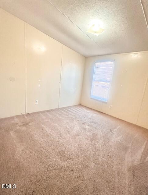7537 Sam Young Road Oxford, NC 27565 - Photo 20 of 28 an empty room with a natural light