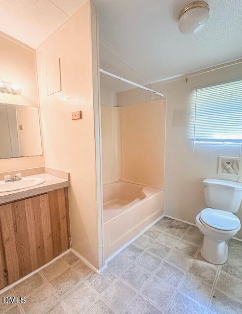 7537 Sam Young Road Oxford, NC 27565 - Photo 21 of 28 a bathroom with a sink toilet and shower